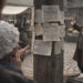 Notices, Gossip, and Gesture Around the Market Cross
